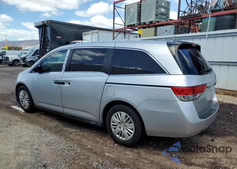 2014 Honda Odyssey Lx z USA, uszkodzony, nr VIN 5FNRL5H22EB118996